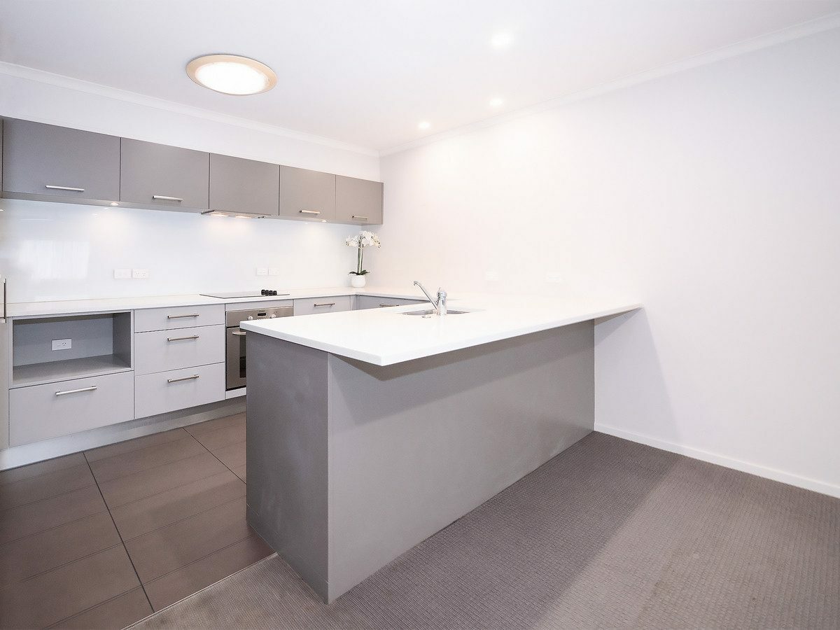 Gated Living Just Moments from Town and Beaches